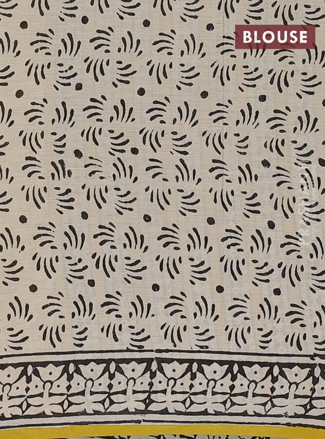 Jaipur cotton saree cream and yellow with allover pailsey buttas and printed border