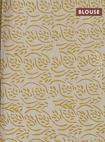 Jaipur cotton saree beige and yellow with allover checked pattern and printed border