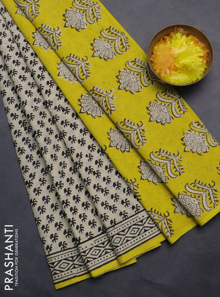 Jaipur cotton saree cream and yellow with butta prinrs and printed border
