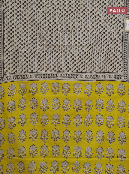 Jaipur cotton saree cream and yellow with butta prinrs and printed border