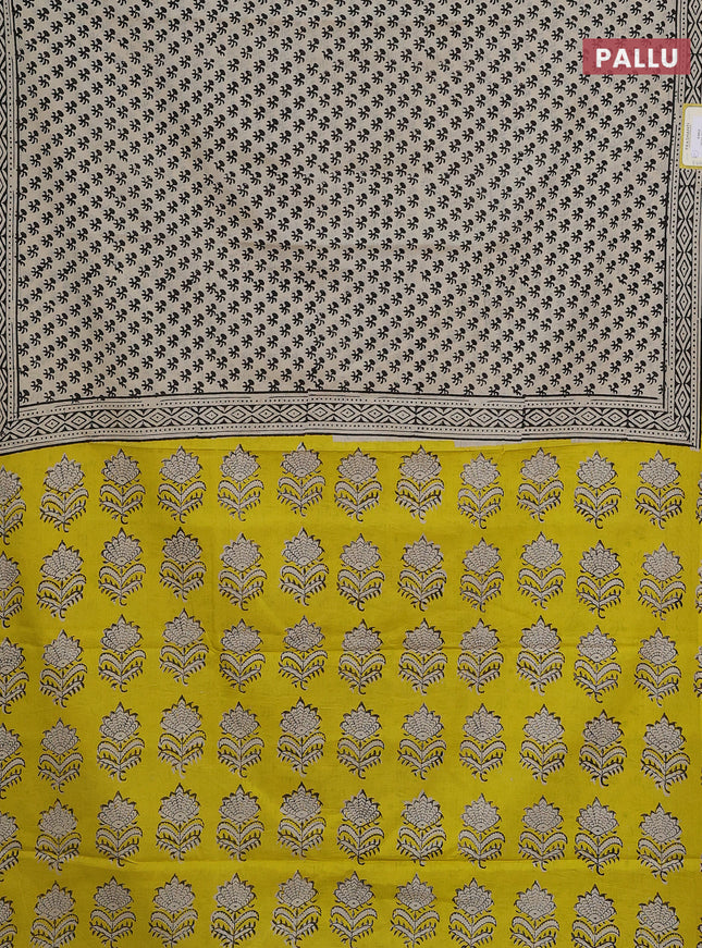 Jaipur cotton saree cream and yellow with butta prinrs and printed border