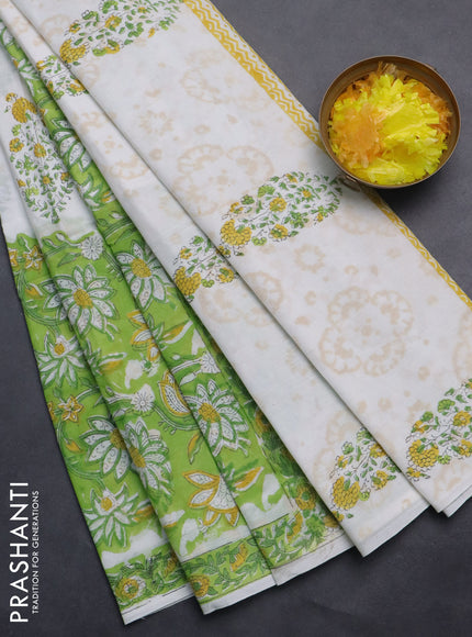 Jaipur cotton saree light green and off white with allover floral prints and printed border