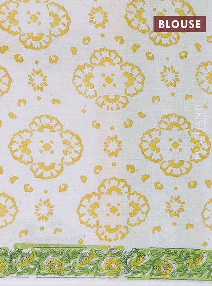 Jaipur cotton saree light green and off white with allover floral prints and printed border