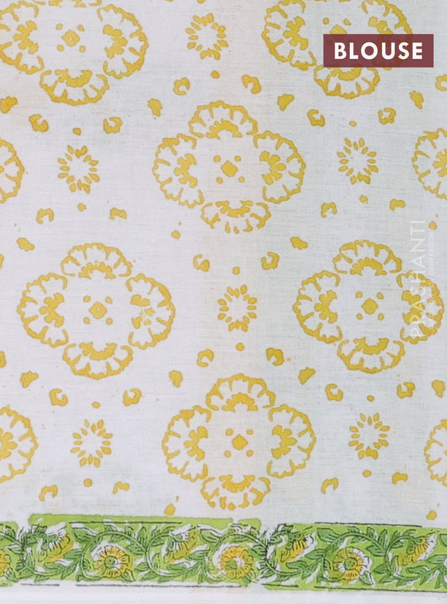 Jaipur cotton saree light green and off white with allover floral prints and printed border