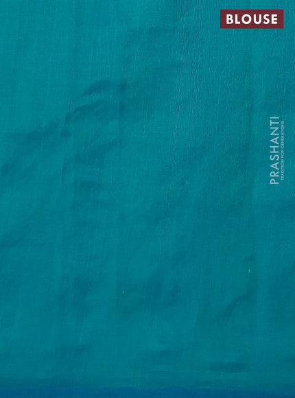 Silk cotton saree dual shade of teal blue with plain body and long kutchi embroidery border