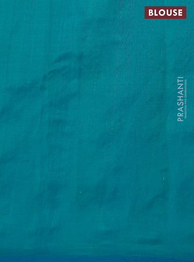 Silk cotton saree dual shade of teal blue with plain body and long kutchi embroidery border