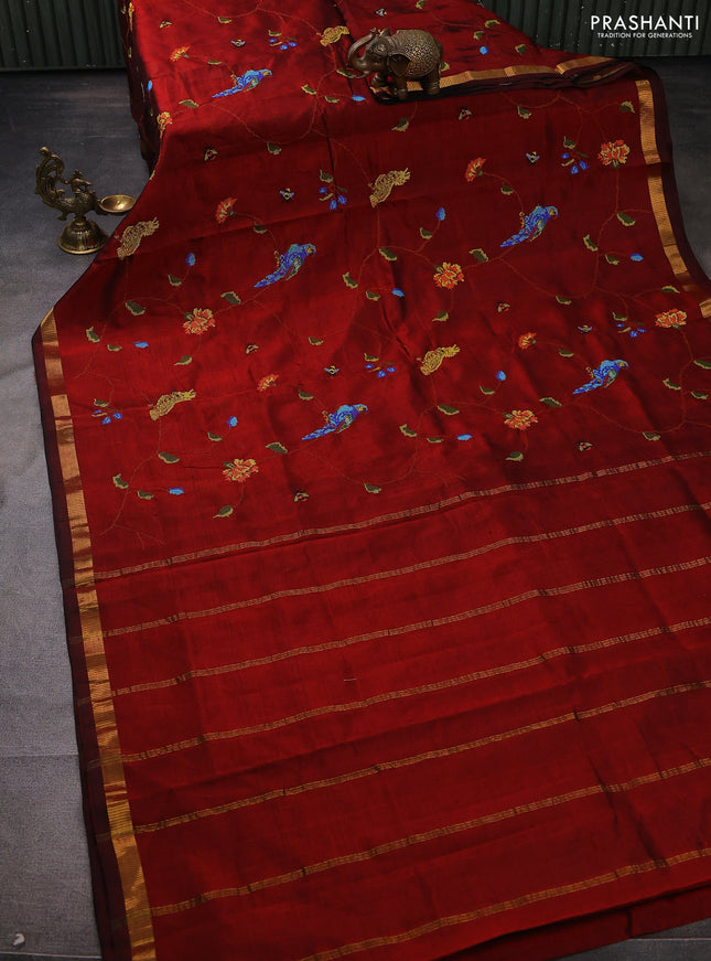 Silk cotton saree maroon with allover embroidery work and zari woven border