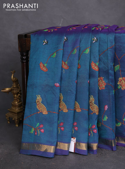 Silk cotton saree dual shade of greenish violet with allover embroidery work and zari woven border