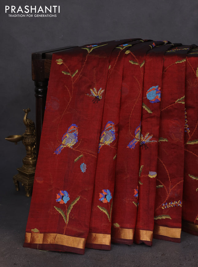Silk cotton saree maroon with allover embroidery work and zari woven border