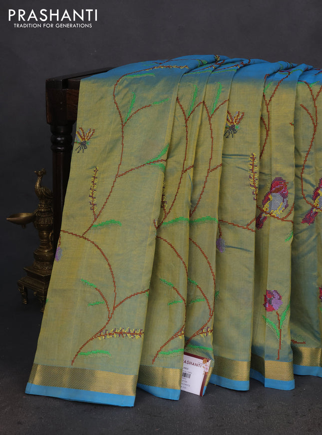 Silk cotton saree dual shade of bluish light green with allover embroidery work and zari woven border