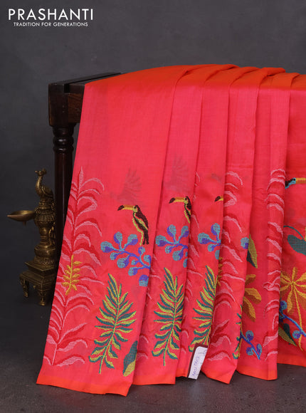 Silk cotton saree dual shade of pinkish orange with plain body and long kutchi embroidery border
