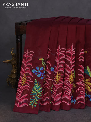 Silk cotton saree wine shade with plain body and long kutchi embroidery border