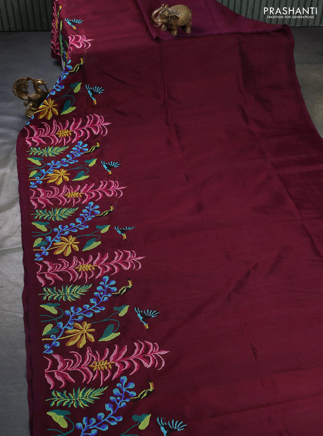 Silk cotton saree wine shade with plain body and long kutchi embroidery border