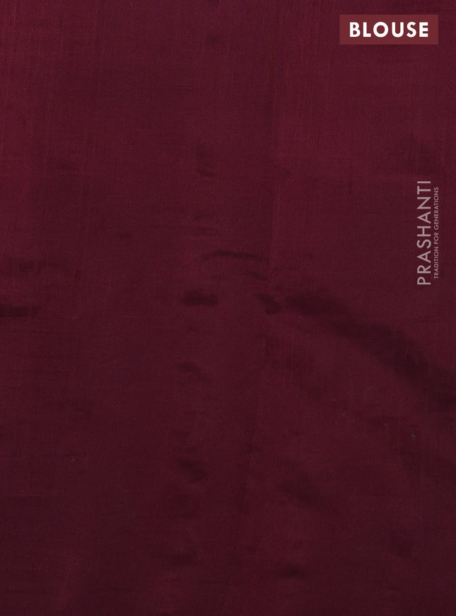 Silk cotton saree wine shade with plain body and long kutchi embroidery border