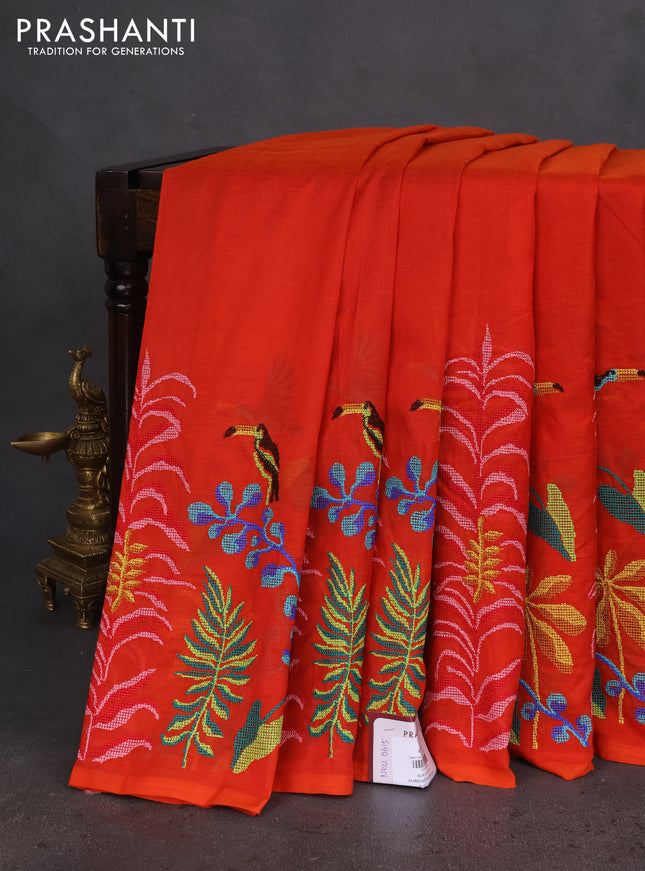 Silk cotton saree orange with plain body and long kutchi embroidery border