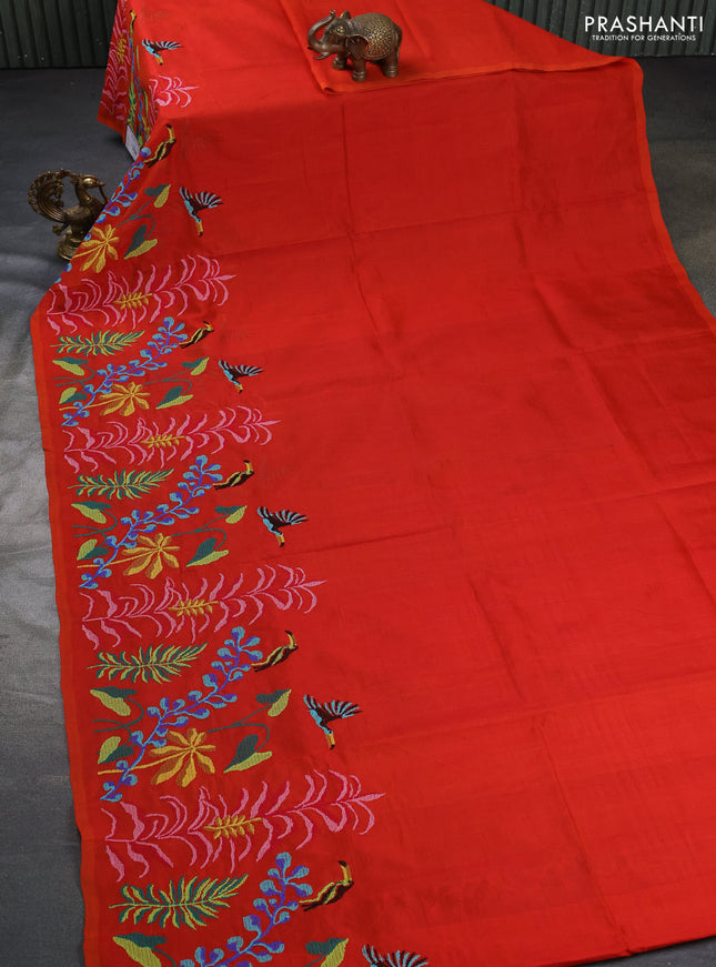 Silk cotton saree orange with plain body and long kutchi embroidery border