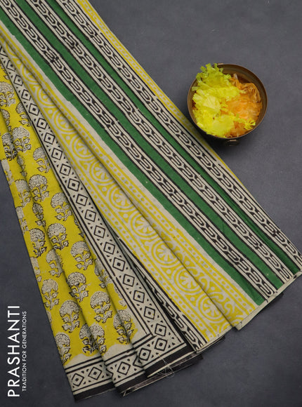 Jaipur cotton saree yellow and black with allover floral butta prints and printed border