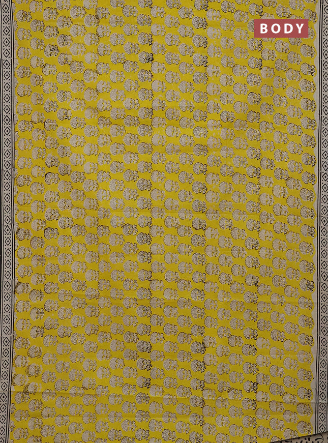 Jaipur cotton saree yellow and black with allover floral butta prints and printed border
