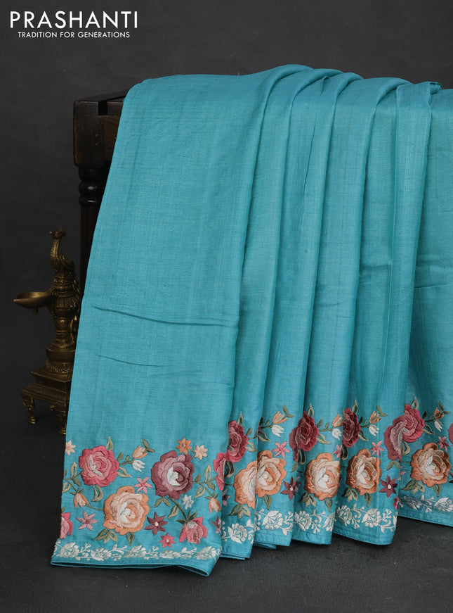 Pure tussar silk saree teal blue with plain body and floral design embroidery work border