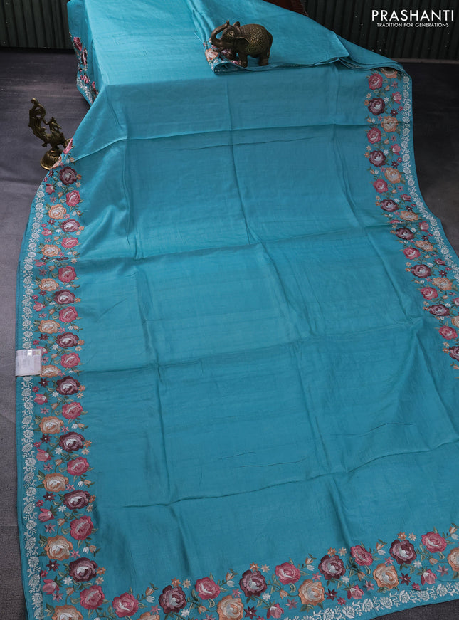 Pure tussar silk saree teal blue with plain body and floral design embroidery work border
