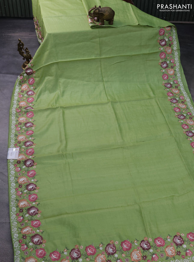 Pure tussar silk saree light green with plain body and floral design embroidery work border