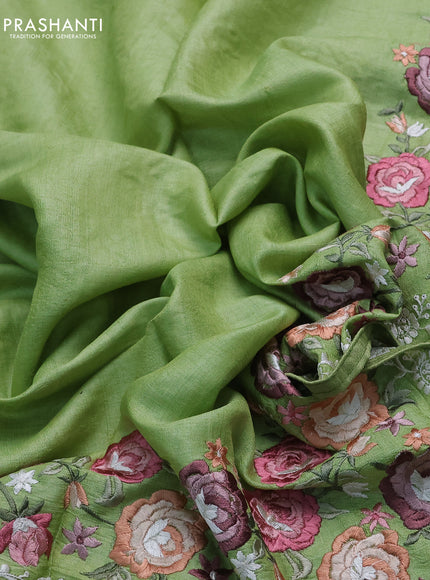 Pure tussar silk saree light green with plain body and floral design embroidery work border