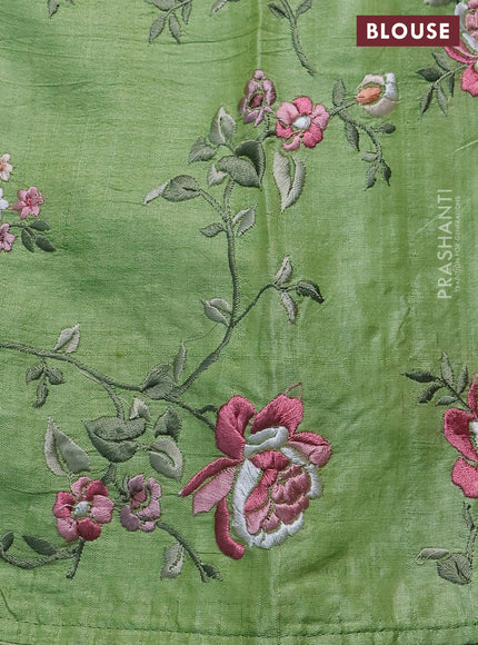 Pure tussar silk saree light green with plain body and floral design embroidery work border