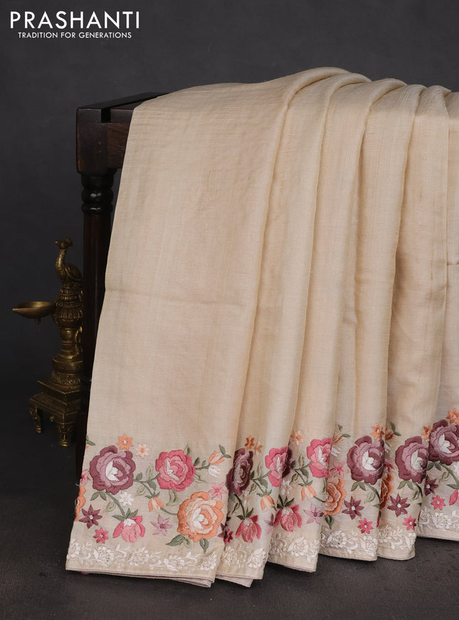 Pure tussar silk saree beige with plain body and floral design embroidery work border