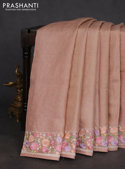 Pure tussar silk saree dark sandal with plain body and floral design embroidery work border