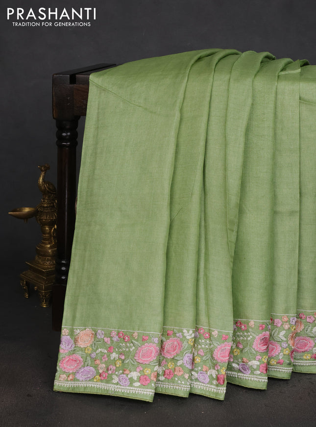 Pure tussar silk saree light green with plain body and floral design embroidery work border