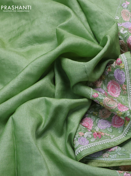 Pure tussar silk saree light green with plain body and floral design embroidery work border