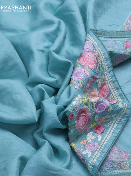 Pure tussar silk saree teal blue with plain body and floral design embroidery work border