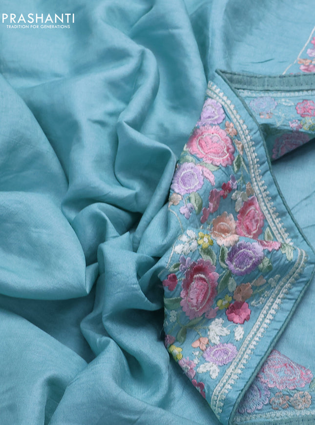 Pure tussar silk saree teal blue with plain body and floral design embroidery work border