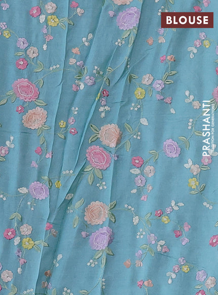 Pure tussar silk saree teal blue with plain body and floral design embroidery work border