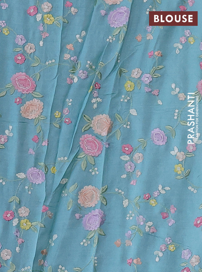 Pure tussar silk saree teal blue with plain body and floral design embroidery work border