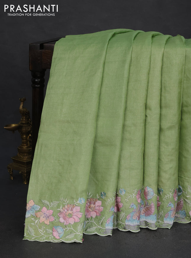 Pure tussar silk saree light green with plain body and floral design embroidery work border