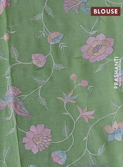 Pure tussar silk saree light green with plain body and floral design embroidery work border