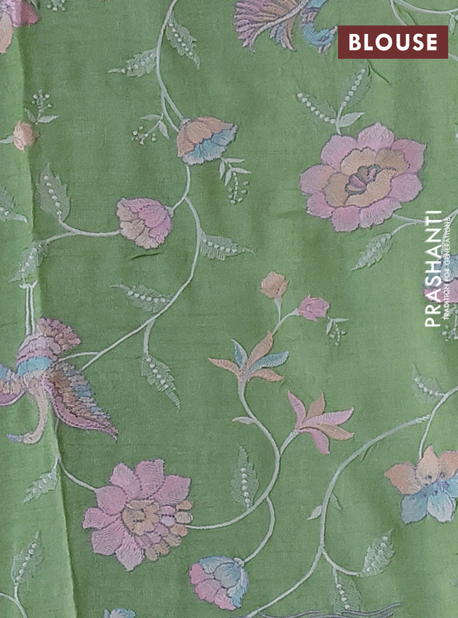 Pure tussar silk saree light green with plain body and floral design embroidery work border