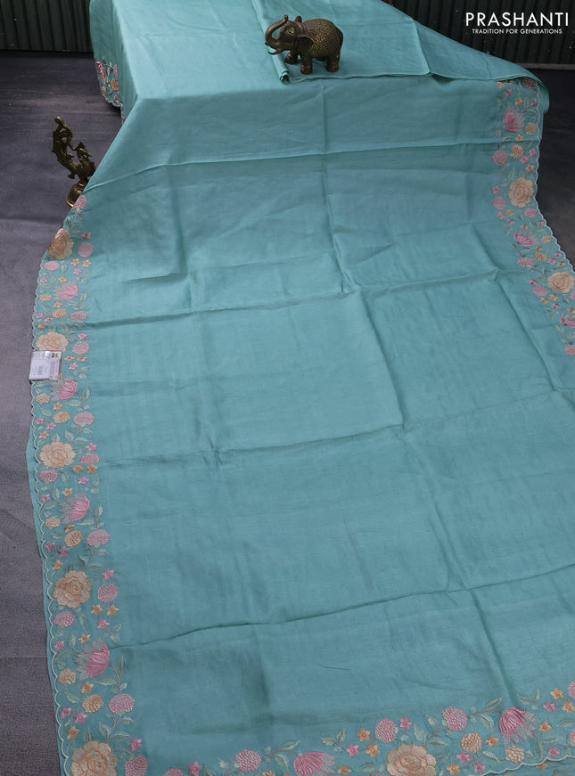 Pure tussar silk saree teal blue with plain body and floral design embroidery work border