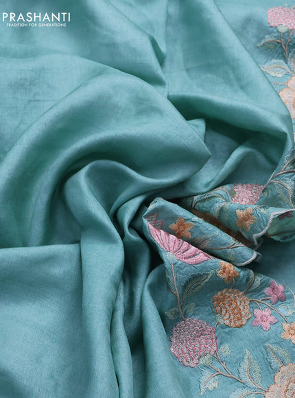 Pure tussar silk saree teal blue with plain body and floral design embroidery work border