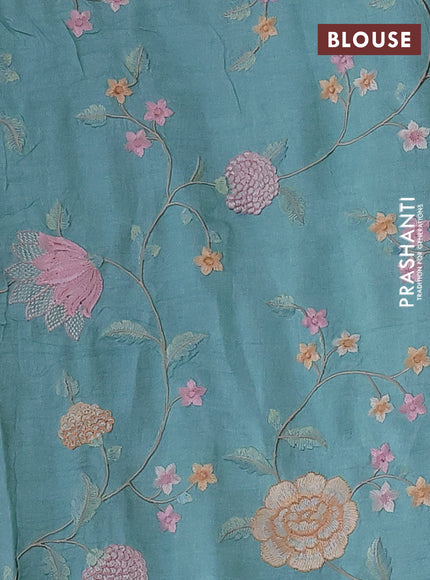 Pure tussar silk saree teal blue with plain body and floral design embroidery work border
