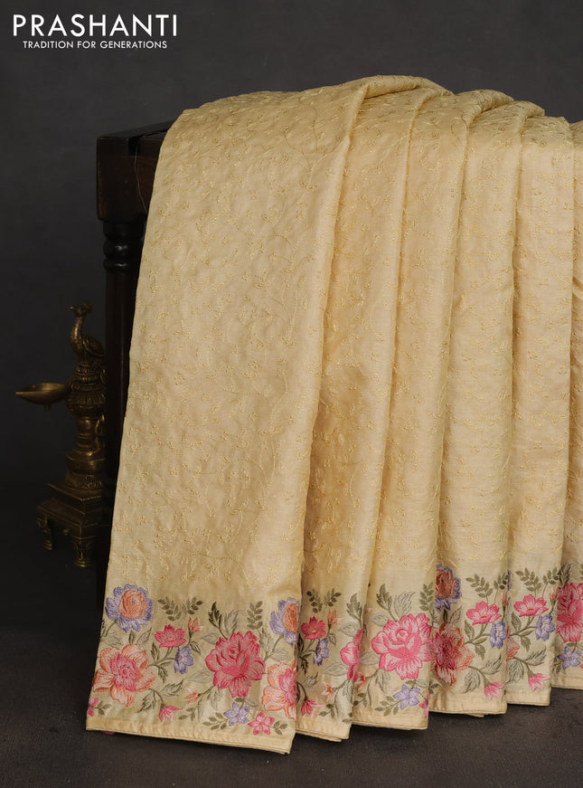 Pure tussar silk saree pale yellow with allover embroidery work and floral design embroidery work border