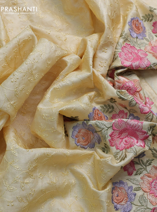 Pure tussar silk saree pale yellow with allover embroidery work and floral design embroidery work border