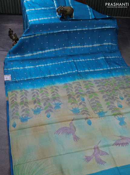 Pure tussar silk saree cs blue and beige with tie & dye prints & pita work and embroidery pallu