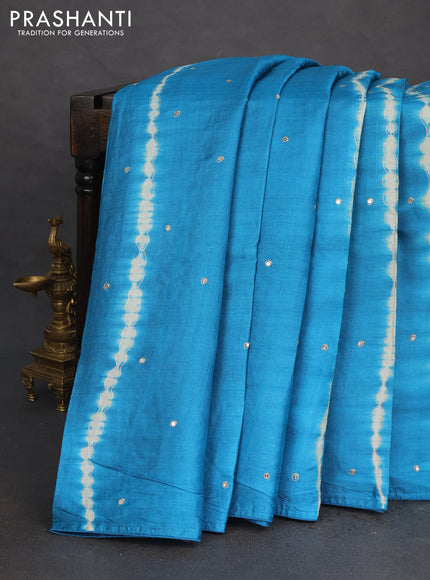 Pure tussar silk saree cs blue and pale yellow with tie & dye prints & pita work and embroidery pallu