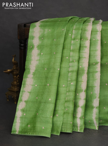 Pure tussar silk saree light green and beige with tie & dye prints & pita work and embroidery pallu