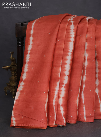 Pure tussar silk saree rustic orange and sandal with tie & dye prints & pita work and embroidery pallu