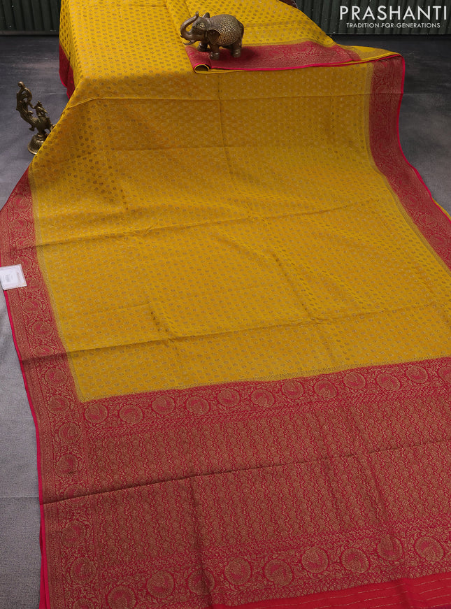 Banarasi semi georgette saree mustard yellow and pink with allover thread & zari woven buttas and woven border