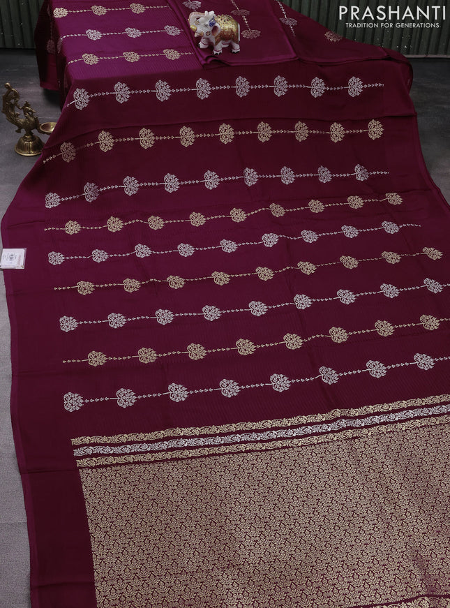 Banarasi mushru silk saree maroon with allover stripes pattern & zari buttas and satin border