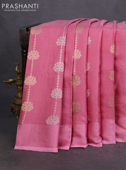 Banarasi mushru silk saree pastel pink with allover stripes pattern & zari buttas and satin border